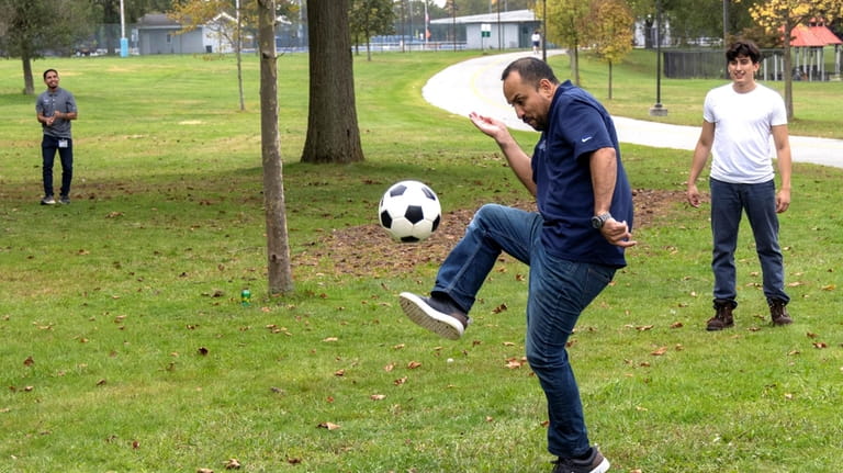 Jose Pereyra, of Selden, shows off his soccer skills at...