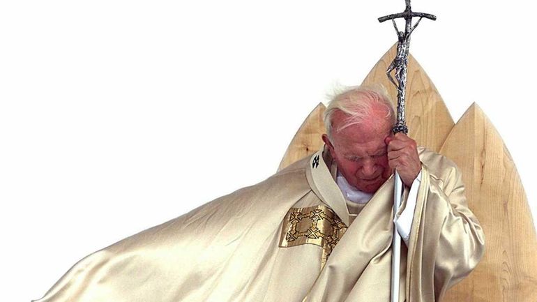 Pope John Paul II celebrating a mass of beatification of...