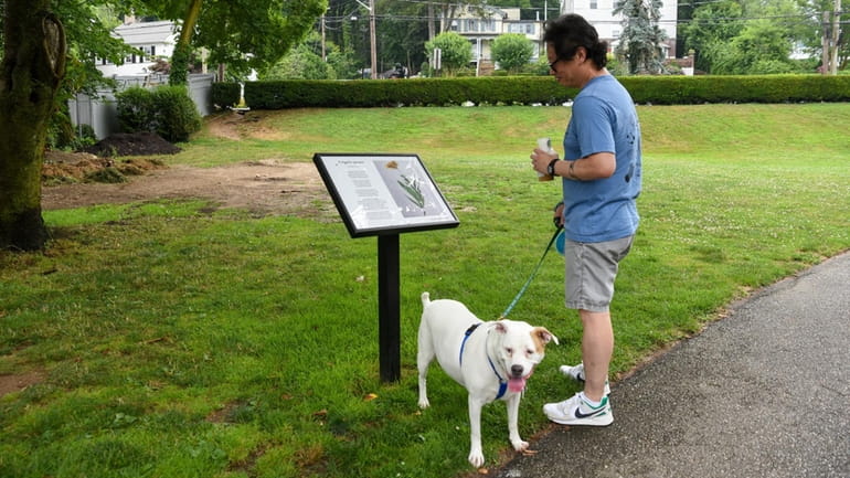 William Cheung, of Asharoken, and his dog Kona check out...