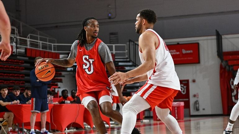 Former St. John's guard Daniss Jenkins returns to the court to...