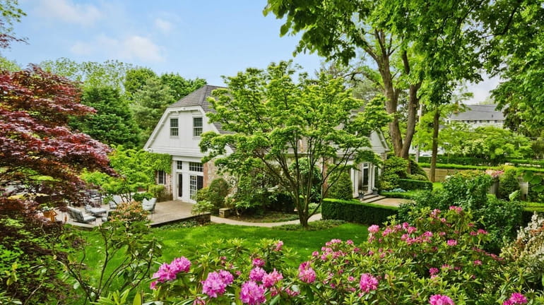 The circa-1914 Lattingtown home was listed for $1.95 million in...