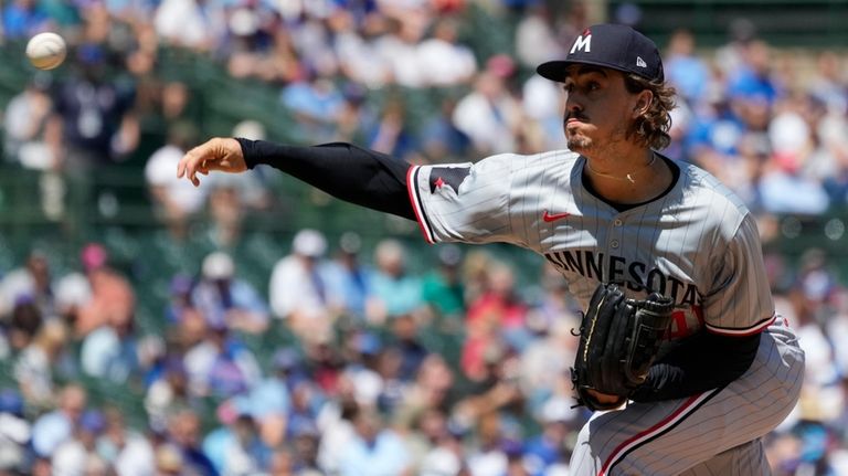 Minnesota Twins starting pitcher Joe Ryan throws against the Chicago...