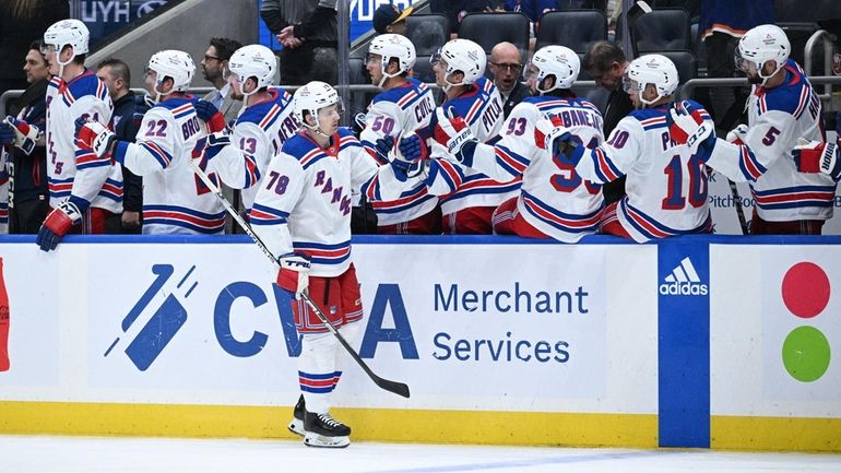 New York Rangers left wing Brennan Othmann celebrates a Ranger...