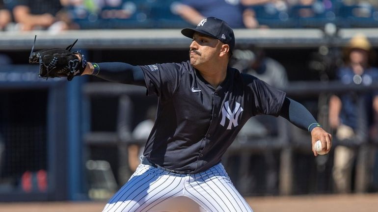 Yankees’ starting pitcher Nestor Cortes throwing in the top of...