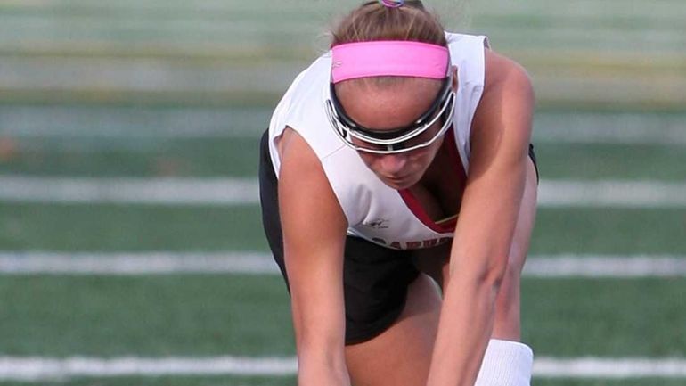 Garden City's Michaela Bruno hits the ball in the second...