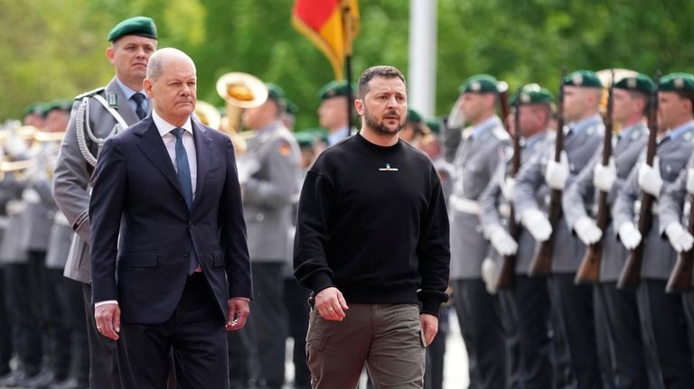 Germany's Chancellor Olaf Scholz, second left, and Ukraine's President Volodymyr...