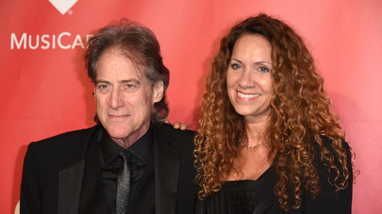Comedian Richard Lewis, left, and Joyce Lapinsky arrive at the...