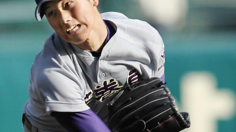 Shohei Ohtani, an 18-year-old Hanamaki Higashi High School student, pitching...