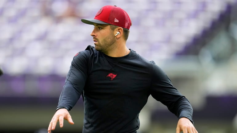 Tampa Bay Buccaneers quarterback Baker Mayfield warms up before an...