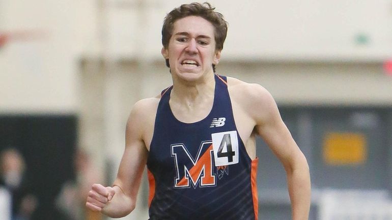 Manhasset's Daniel Maass wins the 1000 meter run during the...