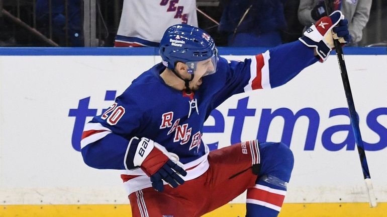 Rangers left wing Chris Kreider reacts after he scored the...