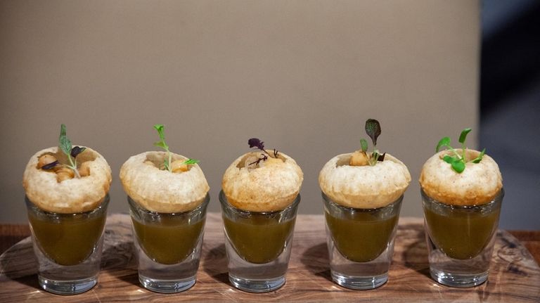 Pani Puri (crispy wheat shells, spiced garbanzoand and tamarind mint...