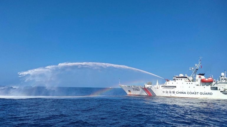 In this photo provided by the Philippine Coast Guard, a...