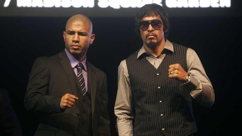 Reigning WBA Super Welterweight Champion, Miguel Cotto, left, of Puerto...