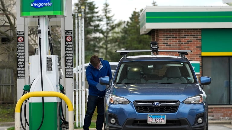 A customer stops for fuel at a gas station in...