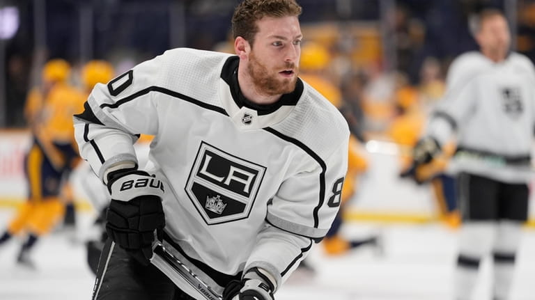 Los Angeles Kings center Pierre-Luc Dubois (80) warms up before...