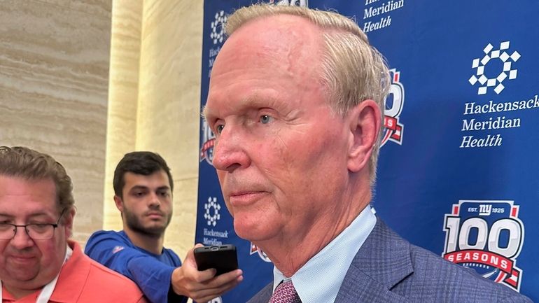 Giants co-owner John Mara speaks to the media Thursday during...