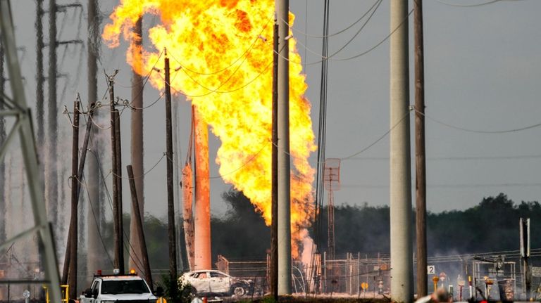 A massive pipeline fire burns near Spencer Highway and Summerton...