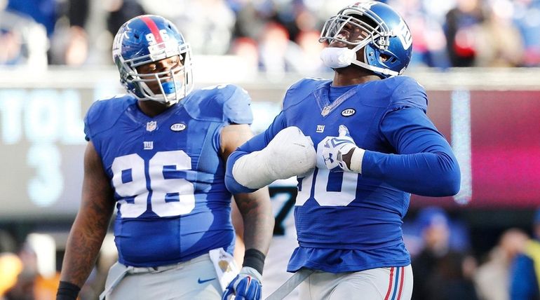 Jason Pierre-Paul #90 of the New York Giants celebrates after...