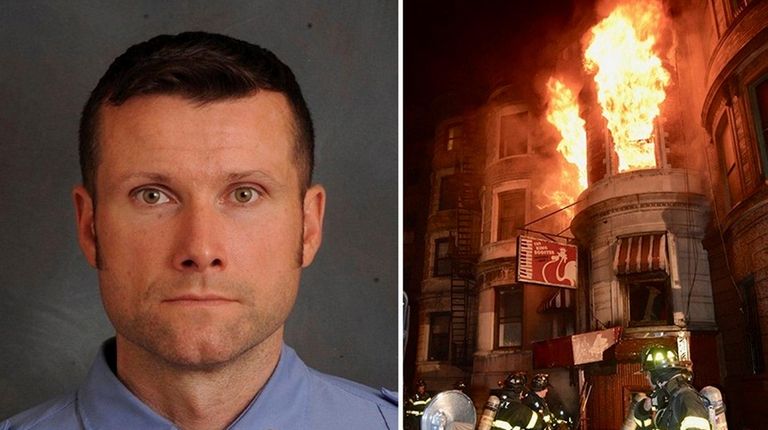 FDNY members, on Friday, at the scene of the fire...