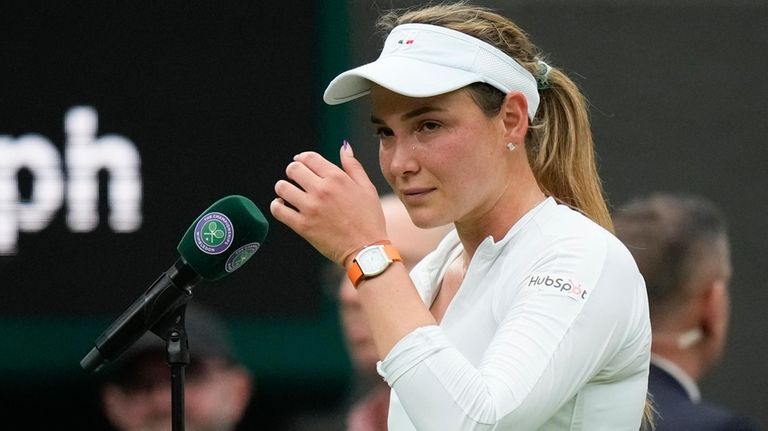 Donna Vekic of Croatia reacts after defeating Lulu Sun of...