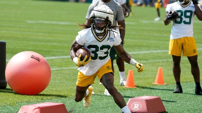 Running backs 1A and 1B lead the Packers offense