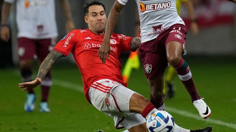 Hugo Mallo of Brazil's Internacional battles for the ball during...