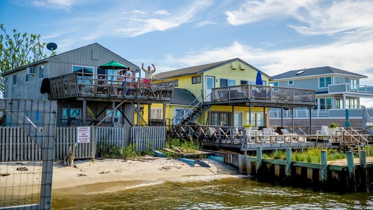 Explore the area of Ocean Bay Park, Fire Island, for...