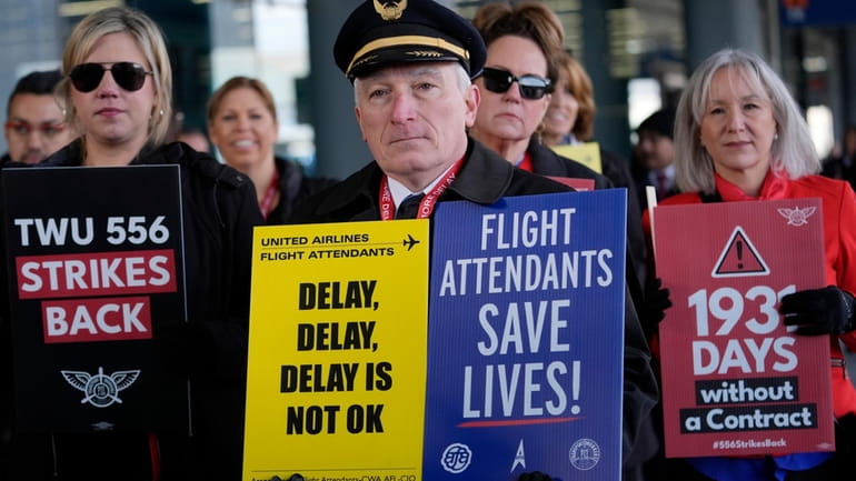 Flight attendants and a pilot protest at O'Hare International Airport...