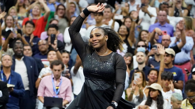 Serena Williams waves to fans after losing to Ajla Tomljanovic,...