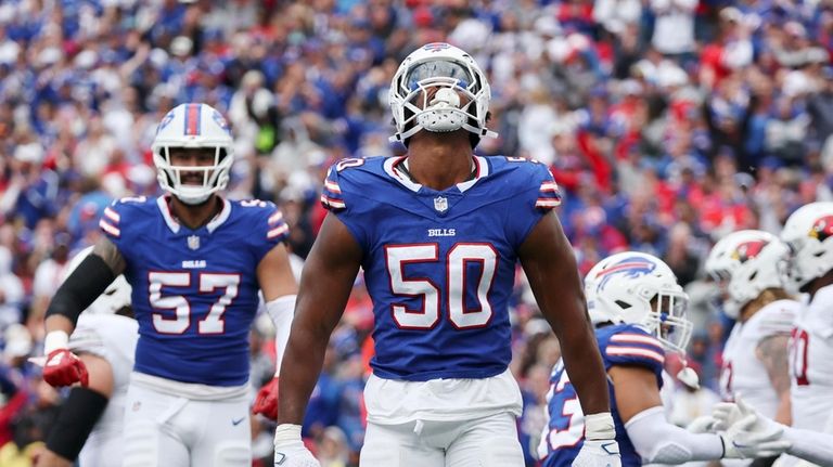 Buffalo Bills defensive end Greg Rousseau (50) celebrates his sack...