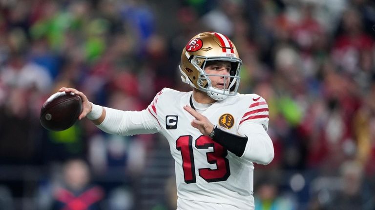 San Francisco 49ers quarterback Brock Purdy throws during the first...