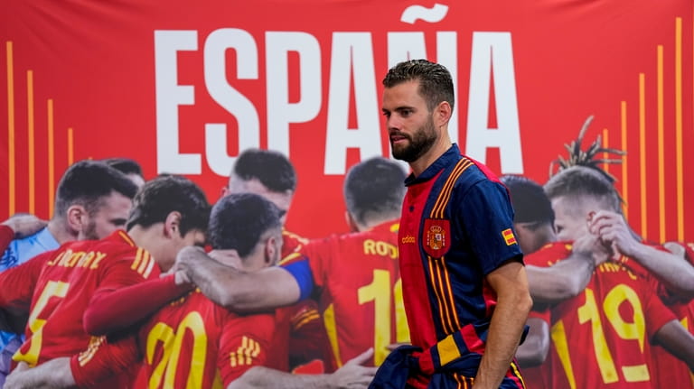 Spain's Nacho arrives for a press conference ahead of Sunday's...
