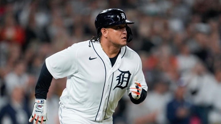 Detroit Tigers' Miguel Cabrera runs out a double against the...
