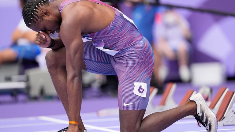 Noah Lyles, of the United States, prepares for his heat...