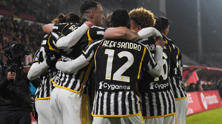 Juventus' players celebrate after Adrien Rabiot scored during the Serie...