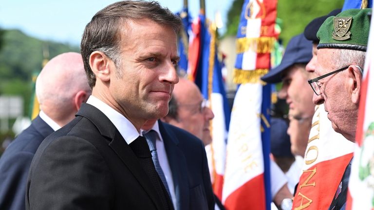 French President Emmanuel Macron attends a memorial ceremony in Tulle,...