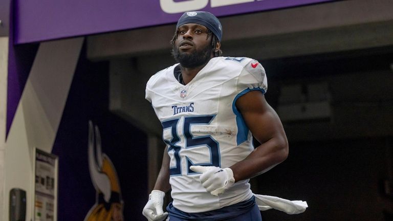 Titans tight end Chigoziem Okonkwo enters the field at U.S...