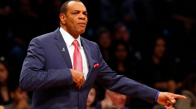 Head coach Lionel Hollins of the Brooklyn Nets looks on...