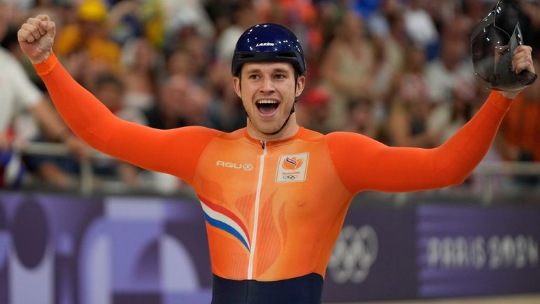 Harrie Lavreysen of Netherlands celebrates winning the gold medal in...