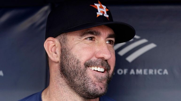 Justin Verlander of the Astros looks on before a game against...