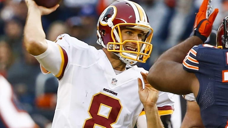 Washington Redskins quarterback Kirk Cousins throws a pass agianst the...