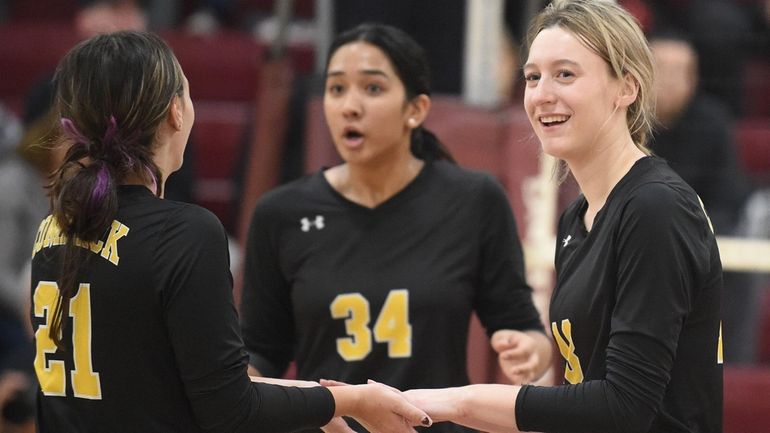 Chloe Masciovecchio #18 of Commack, right, and Casey Colombo #21...