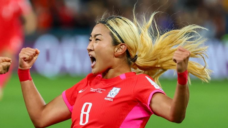 South Korea's Cho So-hyun reacts after scoring her team's first...