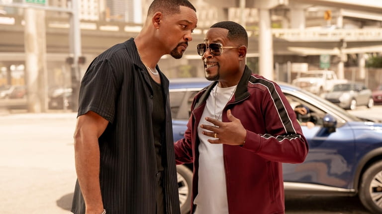 This image released by Sony Pictures shows Will Smith, left,...