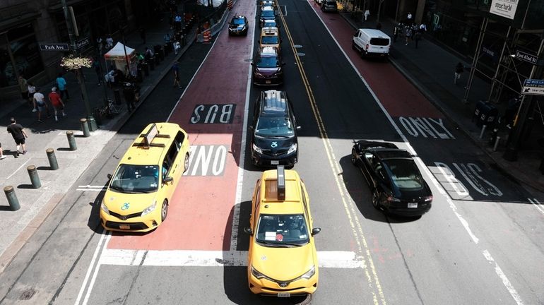 Traffic moves through midtown Manhattan on Wednesday in New York City.