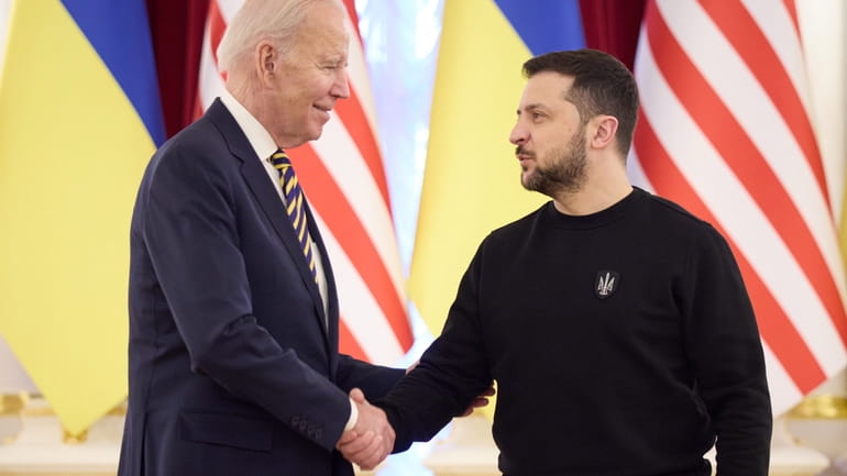 President Joe Biden and Ukrainian President Volodymyr Zelenskyy during their...