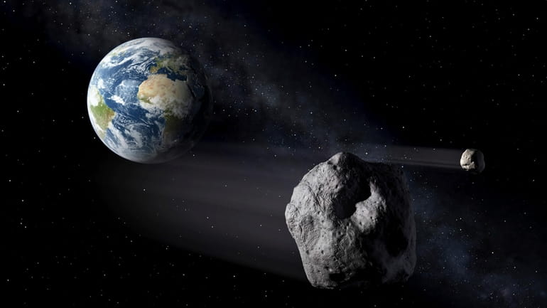 In this artistic rendering, two asteroids fly past Earth. An...