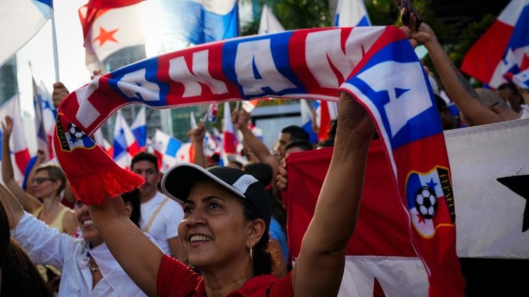 Panamanians celebrate after the Supreme Court declared a 20-year contract...