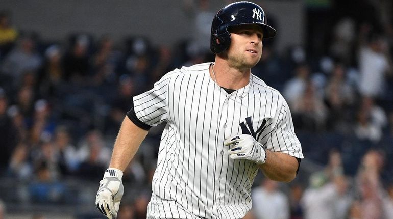 Brett Gardner rounds the bases on his two-run homer in...